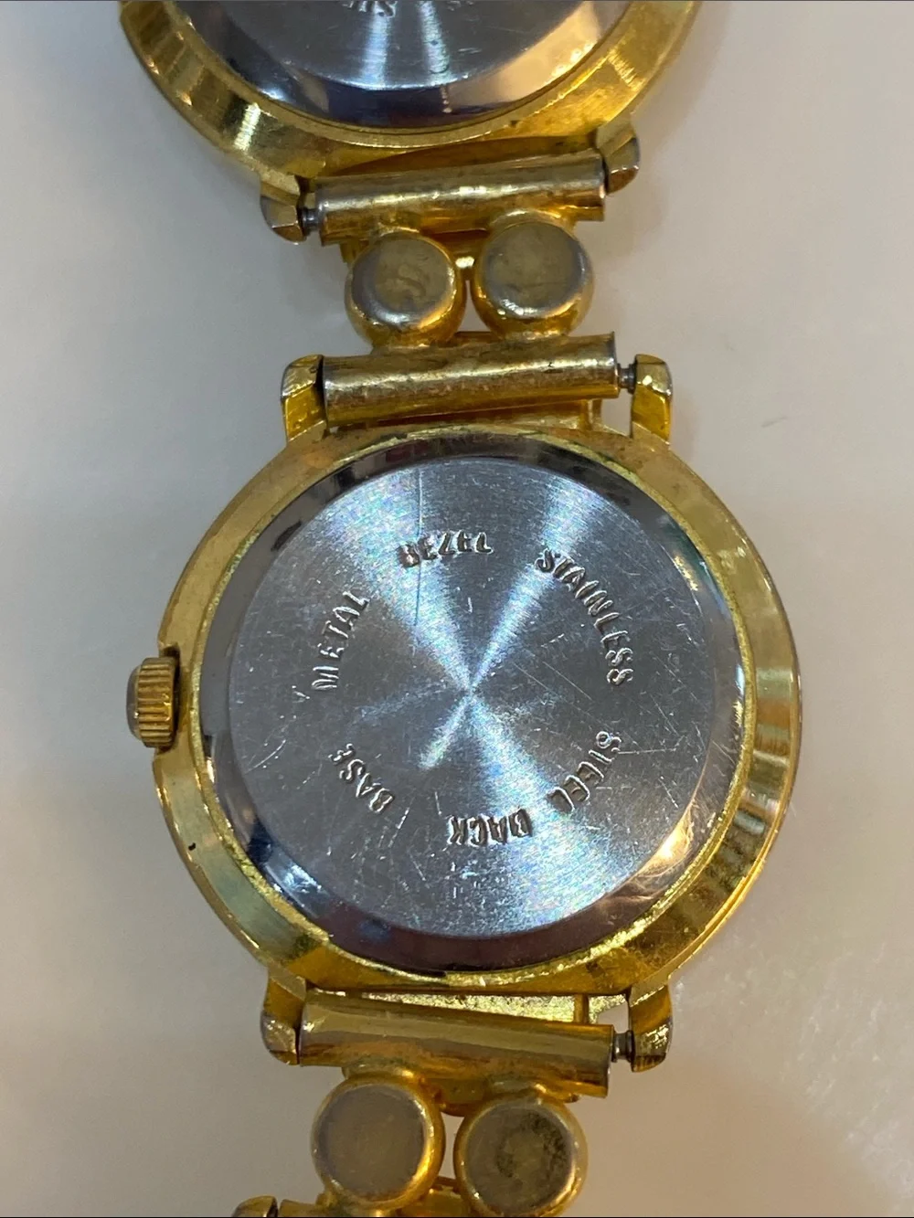 Faux pearl gold tone watch